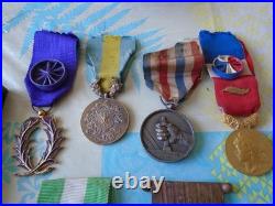 10 Decorations Civiles Et Militaires. (1 Croix De Guerre Funeraire)