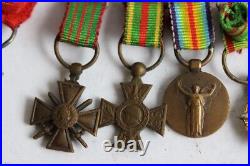 Ancienne barette de 8 mini décorations militaires (36287)