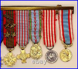 Barrette avec 2 Ordres + 6 Médailles miniatures. France. 2°GM/ WW°2