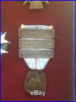 Cinq médailles de guerre dont 1 legion d'honneur et une libération France allem