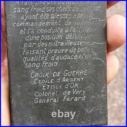 Croix de Guerre 1914-1917, deux étoiles, dans un cadre gravé au dos
