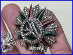 Croix de chevalier de l'ordre du Nicham Iftikar en argent, émaillée