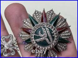 Croix de chevalier de l'ordre du Nicham Iftikar en argent, émaillée