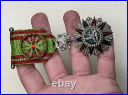 Croix de chevalier de l'ordre du Nicham Iftikar en argent, émaillée Croix de chevalier de l'ordre du Nicham Iftikar en argent, émaillée