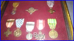 Lot 8 médailles de Guerre dans un coffret cadre