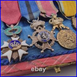 Lot de 4 médailles de décoration militaire / quelques défauts d'émail /