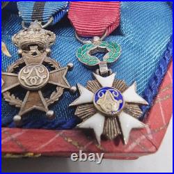 Lot de 4 médailles de décoration militaire / quelques défauts d'émail /