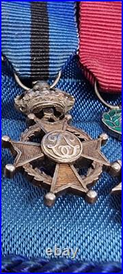 Lot de 4 médailles de décoration militaire / quelques défauts d'émail / belge