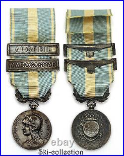 Médaille Coloniale, agrafes MADAGASCAR, ALGERIE. Bélière biface. 1893-1913. Argent