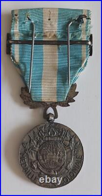 Médaille coloniale Extréme orient signée GAUNT Londres