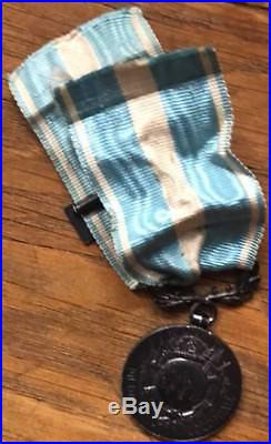 Médaille coloniale agrafe COTE D'IVOIRE à clapet