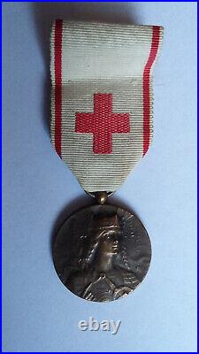 Médaille du cinquantenaire de l'Association des Dames Françaises (ADF). Cr. Rouge