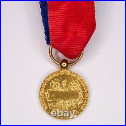 Médaille miniature d'officier de l'ordre du ministère du travail en or
