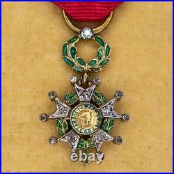 Médaille miniature de la légion d'honneur en or et diamants? Avec son épingle