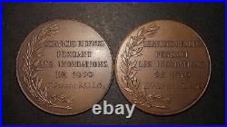 Rare ensemble de deux médailles attribuées à un couple pour les inondations 1910