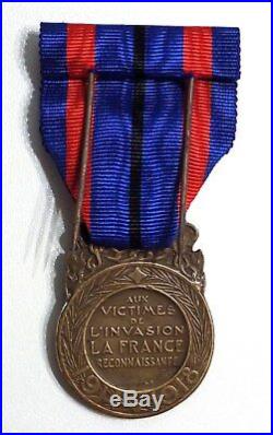 Superbe Médaille des Victimes de l'Invasion dans son écrin