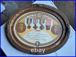 Tableau d'un ensemble de médailles militaire canonnier 1914 1918