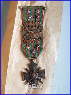 Une Médaille Croix de Guerre 1914-1916 avec un porte bonheurs au dos militaria